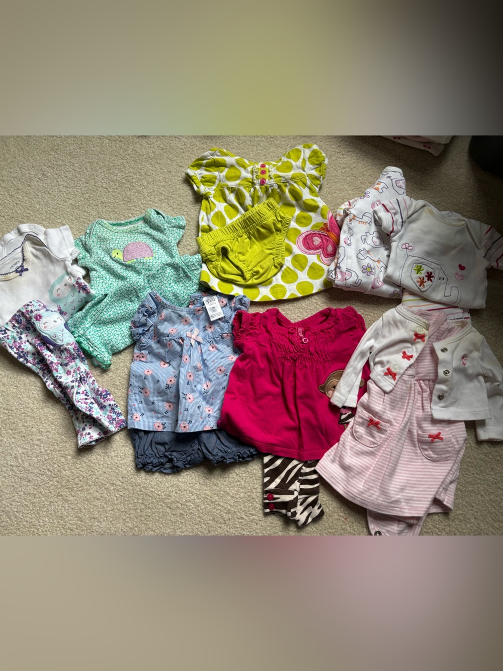 Newborn girl’s clothes lot (over 50 pieces of clothing)